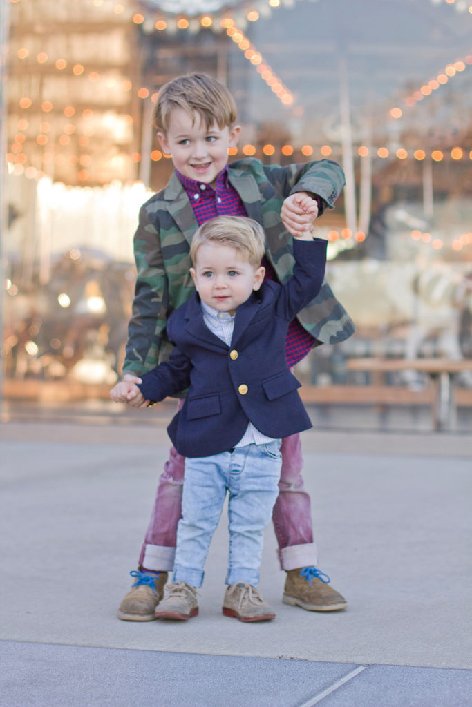 San Francisco Family Photographer - brothers with carousel